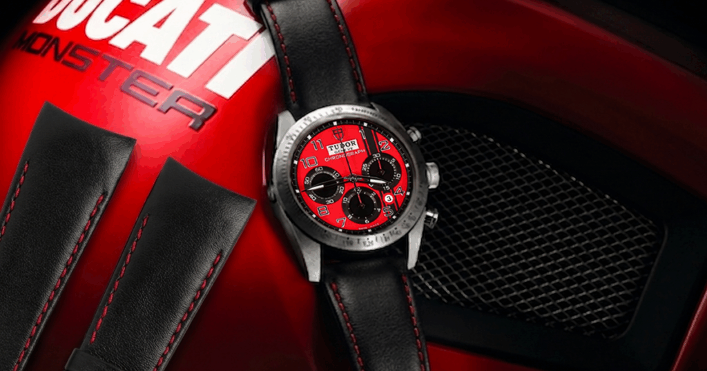 Handmade custom black calfskin leather strap replacement for Tudor Fastrider Ducati 42000 — red stitching chronograph on Ducati Monster background