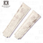 Rolex Submariner strap replacement — himalayan alligator belly-scale pair with flat lug ends in white.