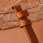 brown cowhide watch strap, keeper and strap edge