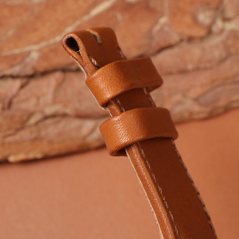 brown cowhide watch strap, keeper and strap edge