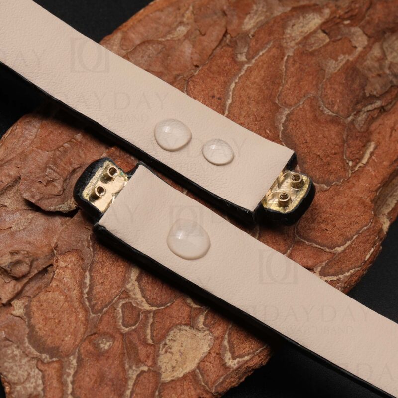 Water resistance calfskin lining of DAYDAY leather strap for Ebel Beluga Mini, showing water beading on the Italian calfskin surface