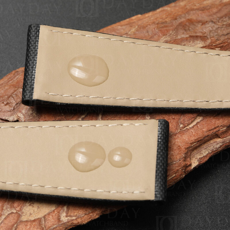 Water-resistant lining of sail canvas watch strap for Cartier, showing beige calfskin inner with water droplets