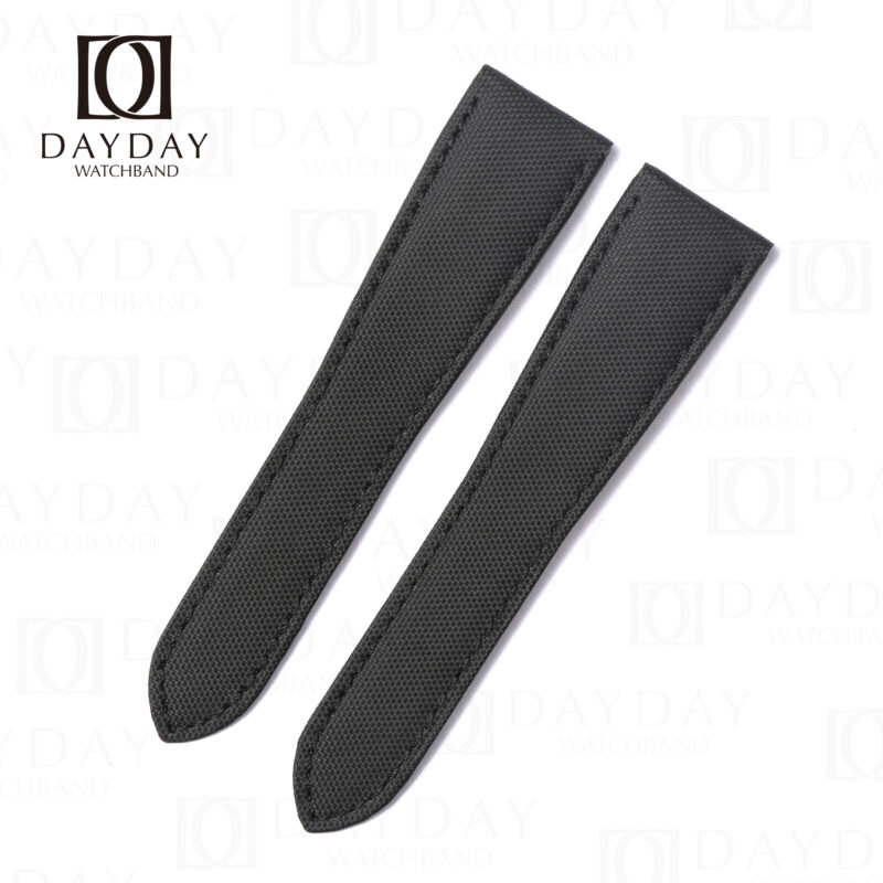 Black sailcloth watch strap for Cartier Calibre de Cartier on white background, displaying full strap profile with rounded ends